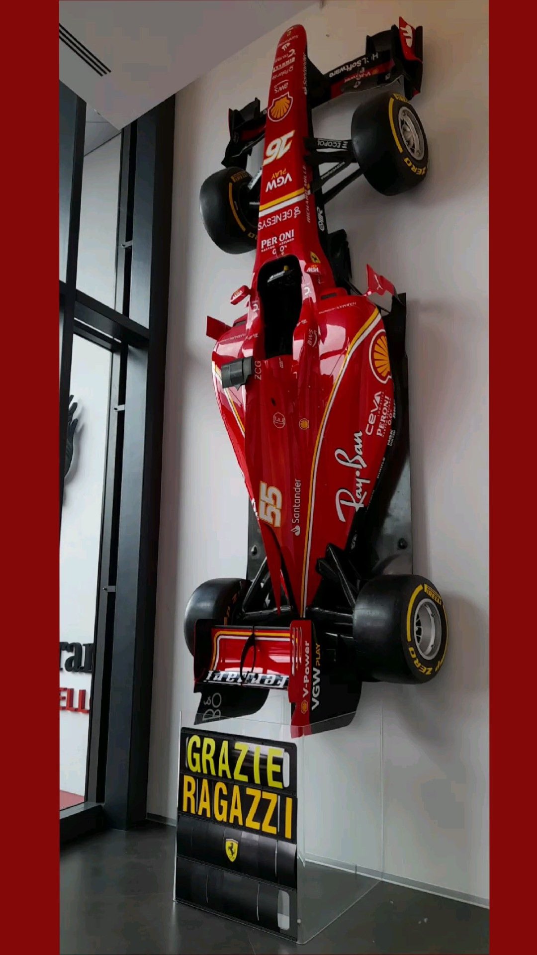 Formula 1 automotive wall sculpture in crimson and gold